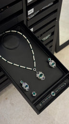 ALZAHIA | PEARLS & PURPLE & GREEN