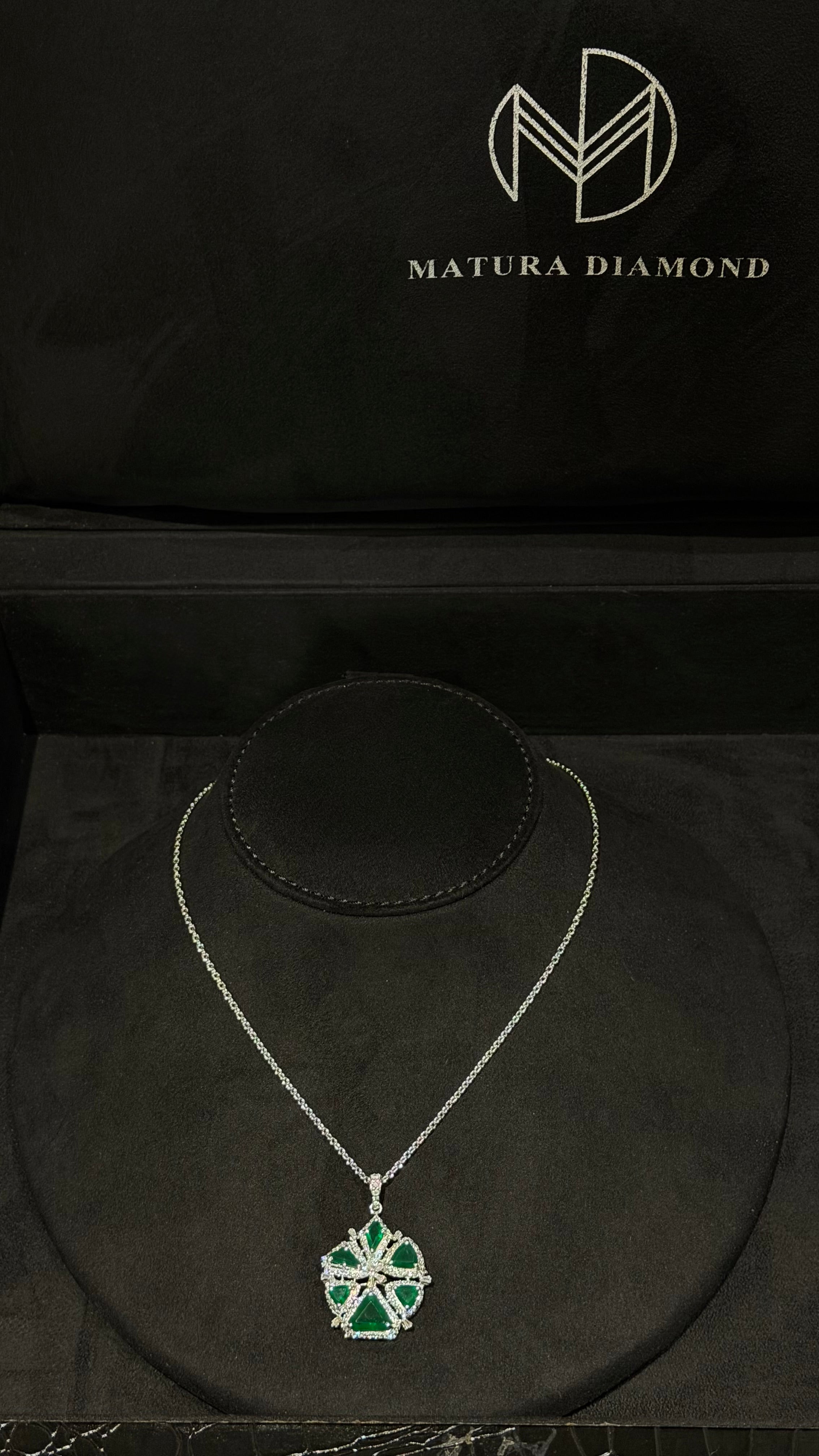ALMUBAZARA | SILVER & GREEN
